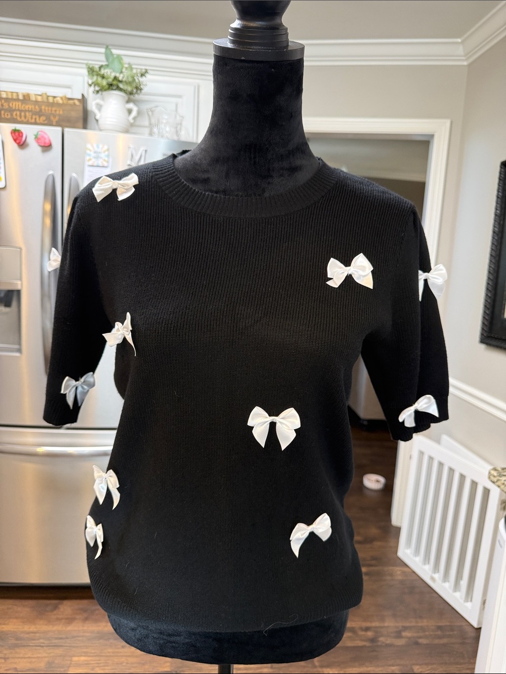 Black Crewneck Sweater with White Bow Accents